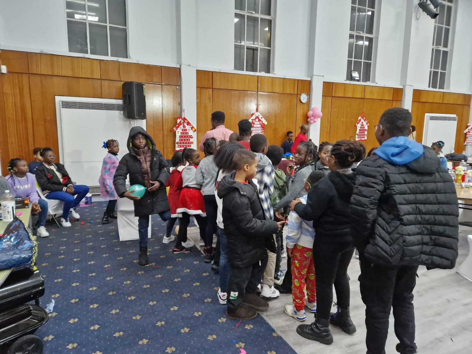 Children playing in decorated hall